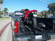 Motorcycle Tow - pickup truck rear view